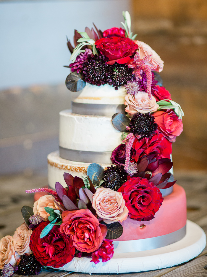 Berry and Red Roses on Three Tiered wedding cake
