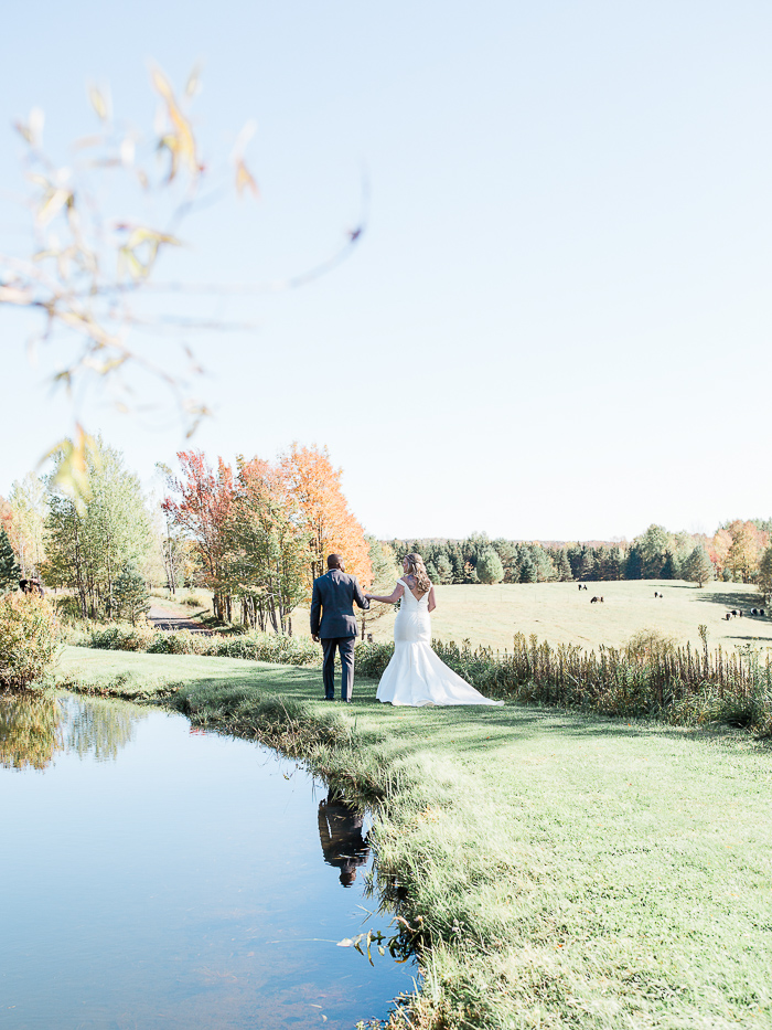 First look between bride and groom outdoor wedding at Seven Farm Pond