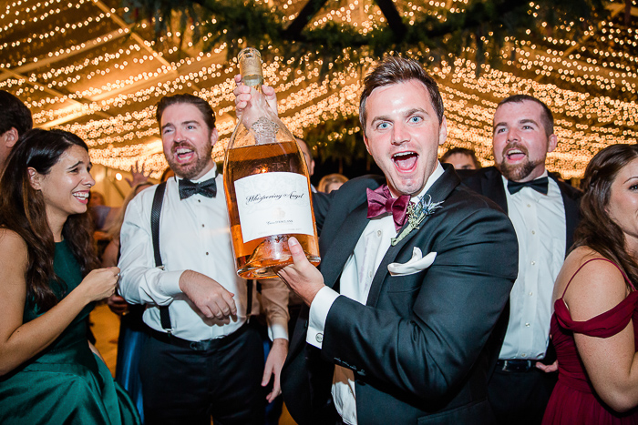 Large bottle of champagne for fun wedding reception