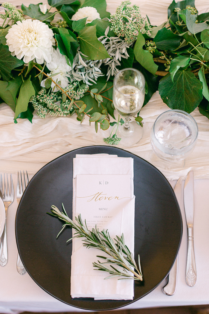 Wedding reception with stunning classic decor and white and greenery wedding color palette