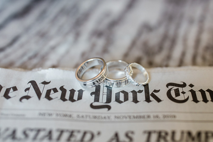 new york paper and wedding rings