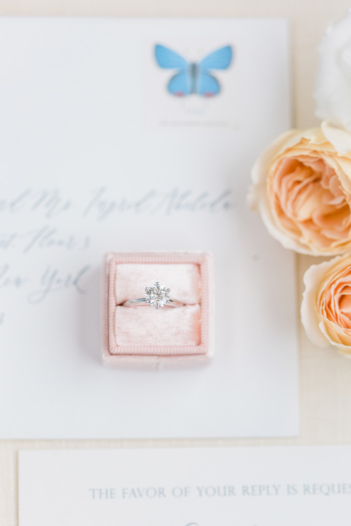 beautiful wedding ring and wedding invitation photo