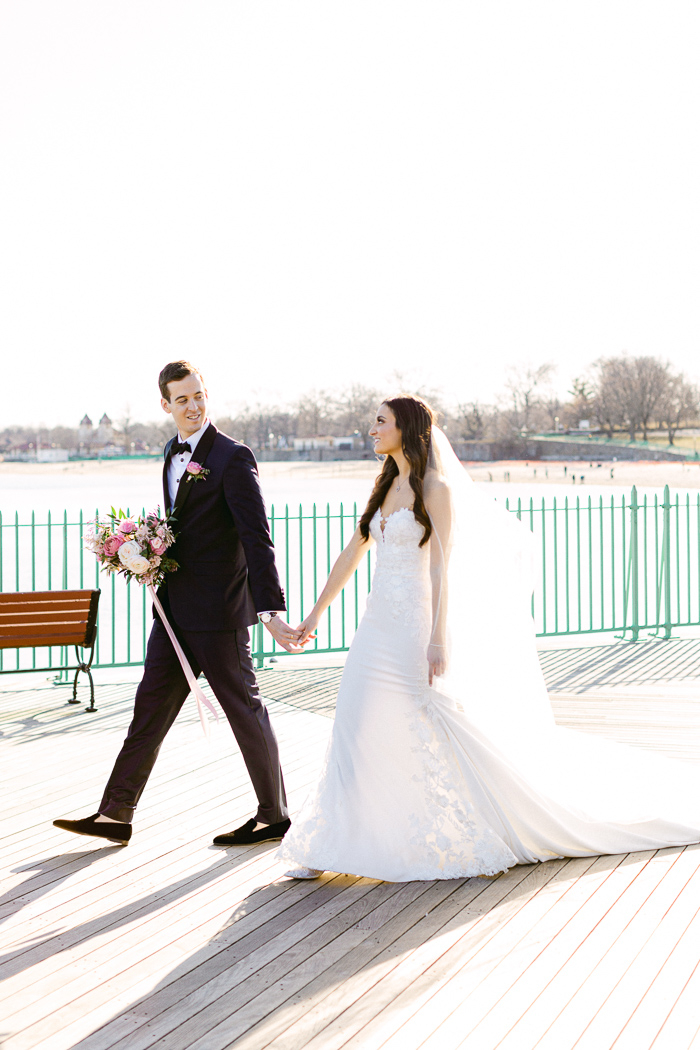 Bride and groom portraits in the spring by the water in Connecticut 