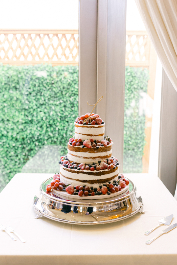 Naked wedding cake with berries