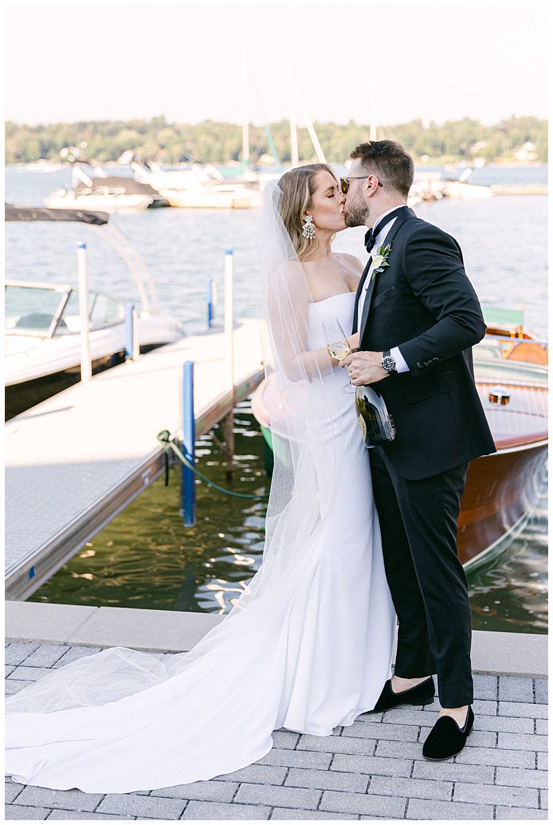OUTDOOR WEDDING PORTRAITS BY THE PIER AT SKANEATELES LAKE