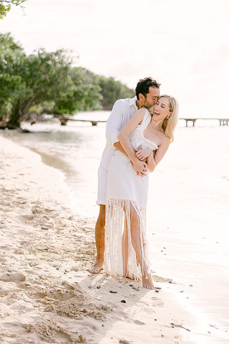 BRIDE AND GROOM PORTRAITS BY THE BEACH