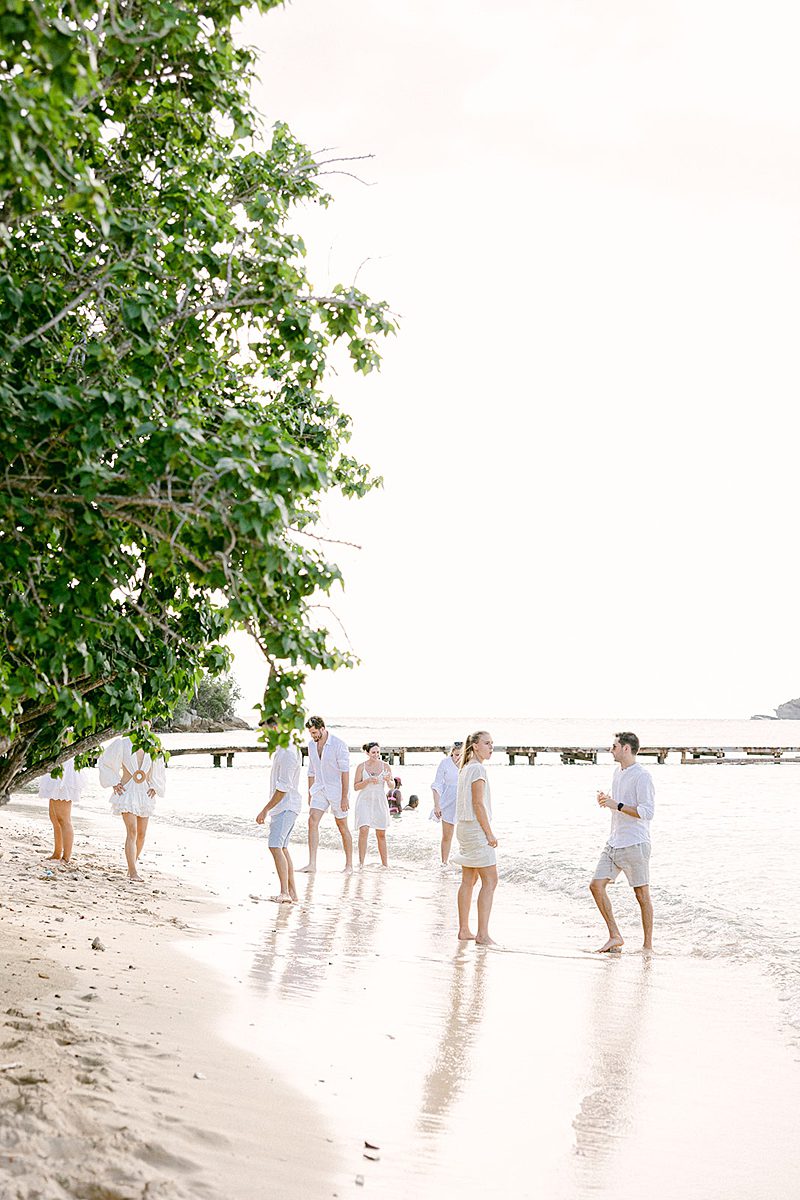 WEDDING GUESTS AT THE BEACH