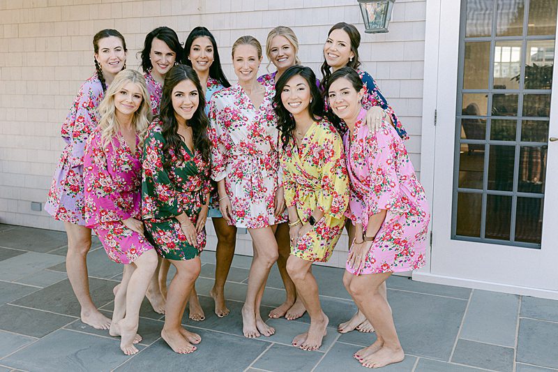 BRIDE WITH BRIDESMAIDS OUTSIDE 