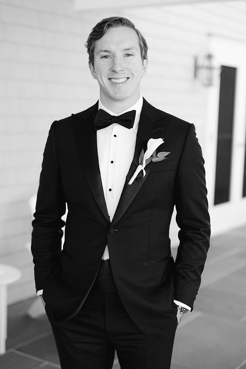 BLACK AND WHITE PORTRAIT OF GROOM
